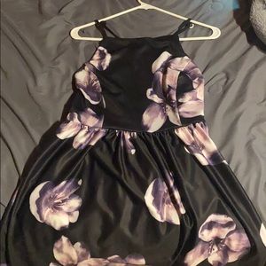 Black dress/ purple flowers